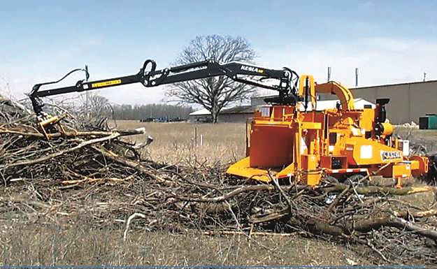 Remote Controlled Kesla Loaders on Larger Hand-Fed Chippers